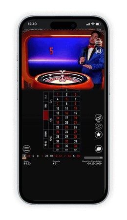 Skrini ya simu inaonyesha mchezo wa roulette wa moja kwa moja wenye namba za dau na gurudumu.